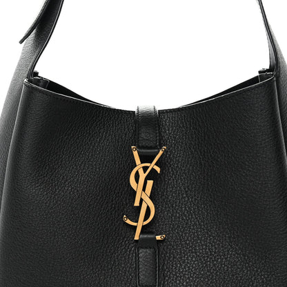 Black leather hobo bag opening with YSL logo and snap closure tab at center.