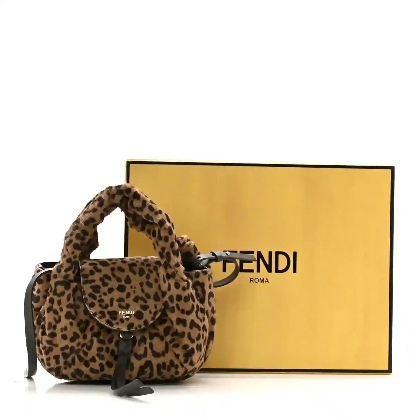 Leopard print mini spy bag with top handle, front flap, and adjustable strap