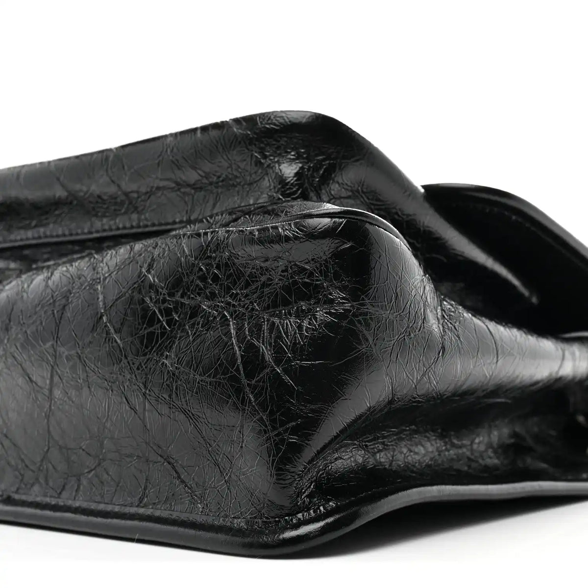Black crinkled calfskin medium chain satchel with curved flap and top edge