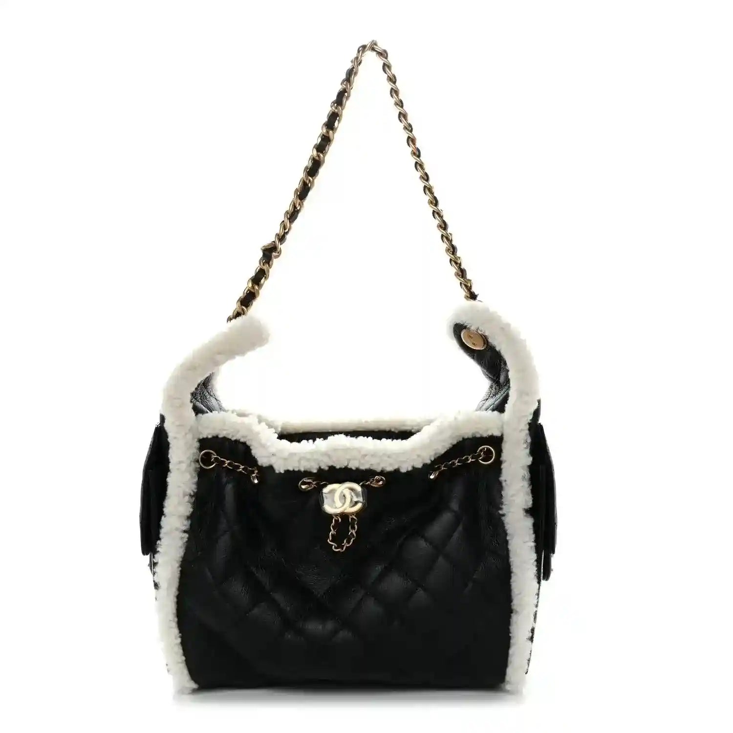 Black quilted handbag with white shearling lining, chain strap, and logo turn-lock