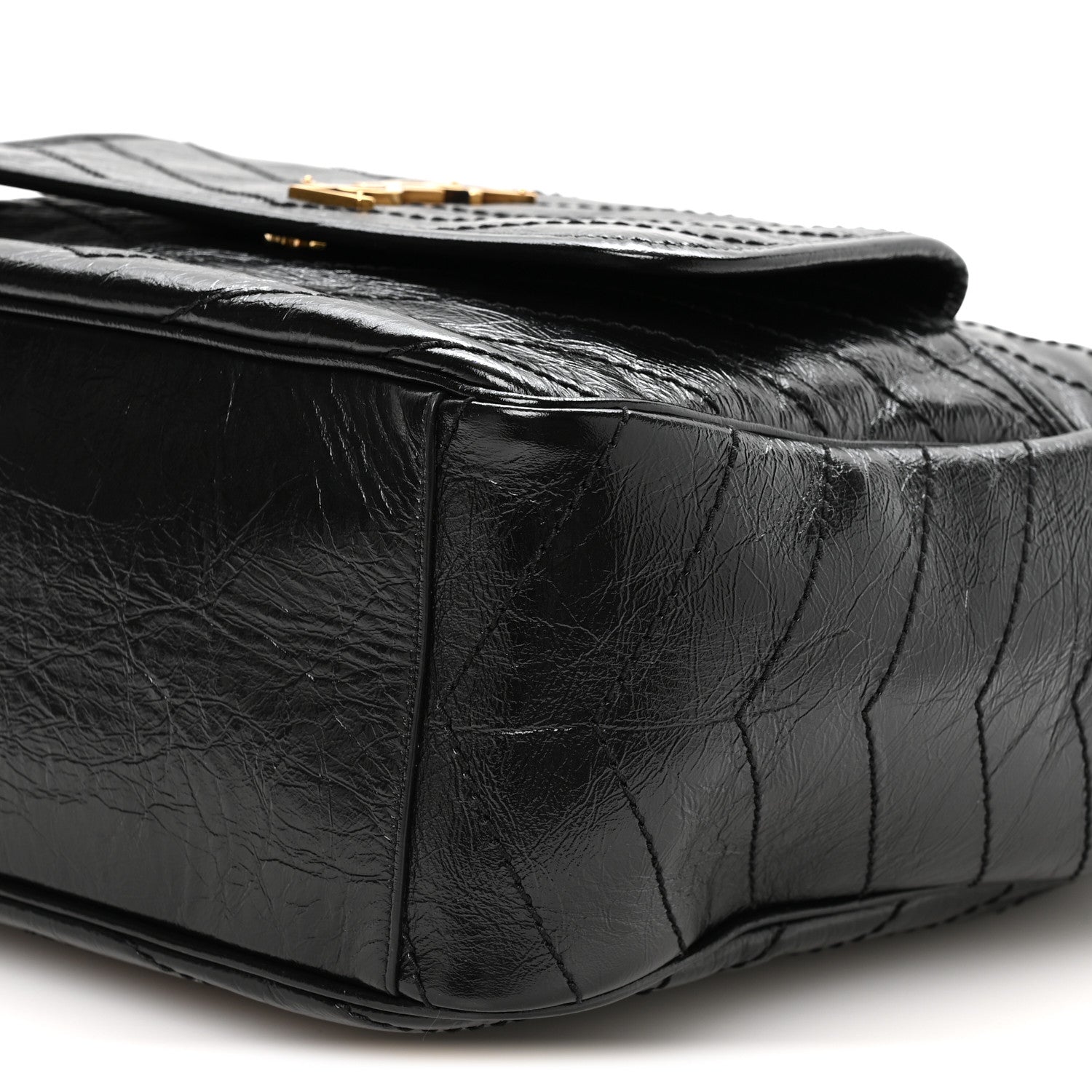 Black quilted leather tote closeup with textured crinkled finish