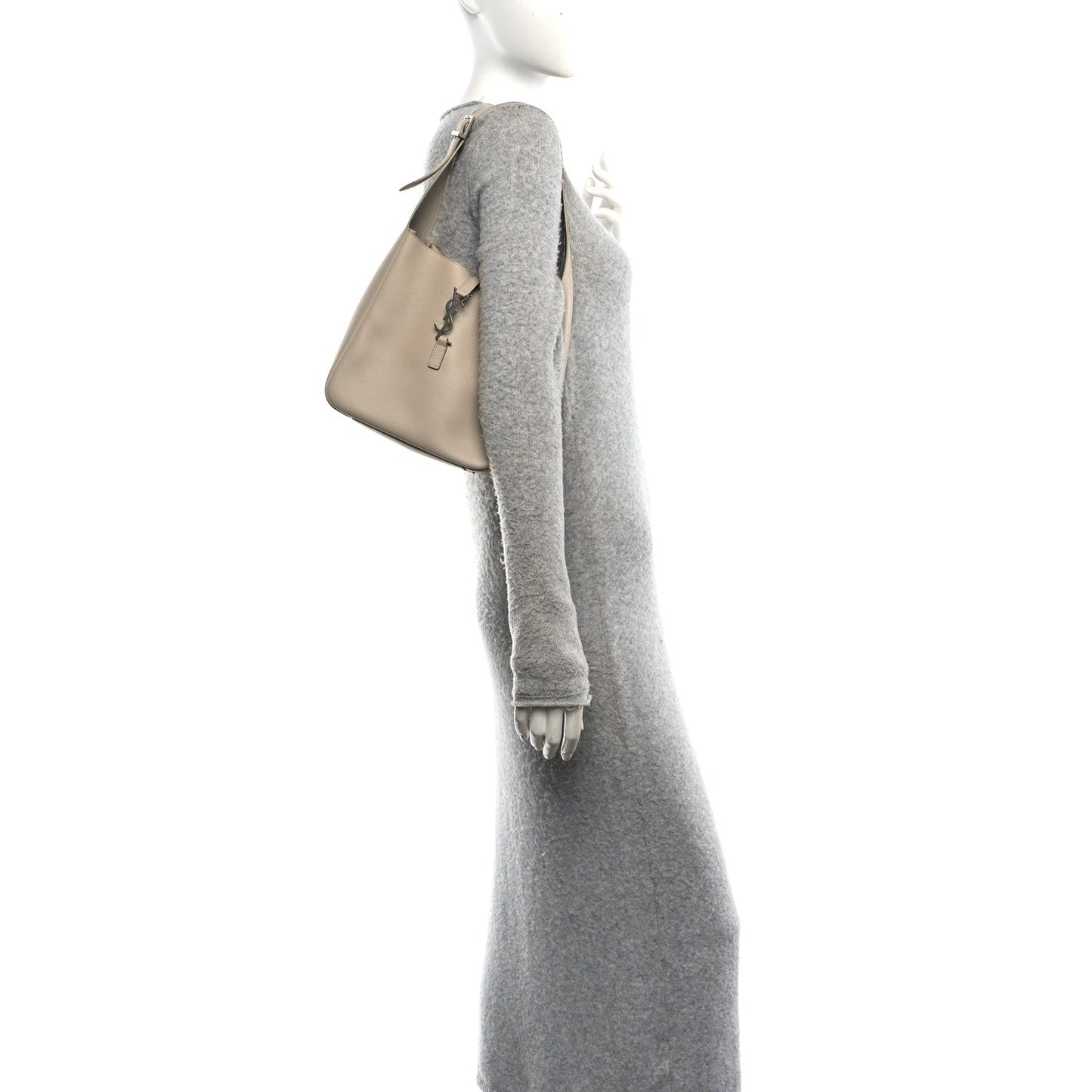 Light beige small hobo bag with short handles, shown from a side angle