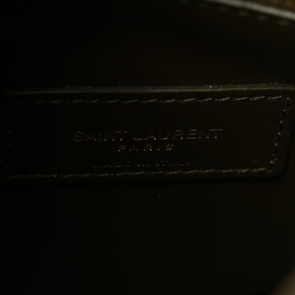 Stitched Saint Laurent logo on leather front panel with contrast trim.