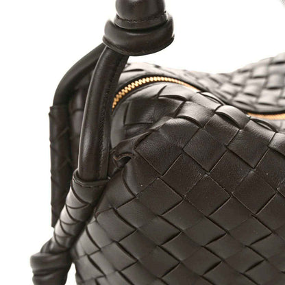 Nappa intrecciato weekender bag top handle and woven leather panel, dark leather