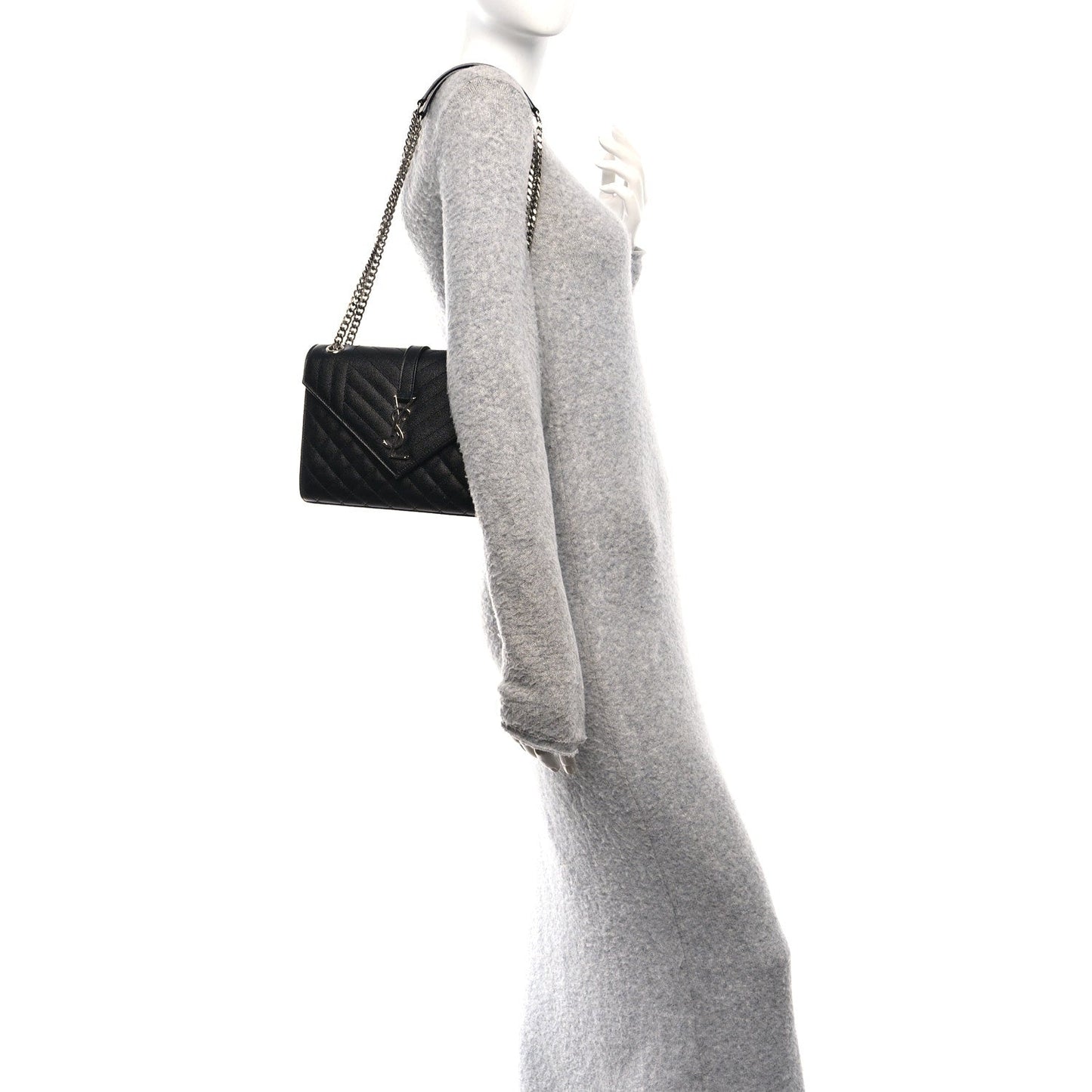 Black quilted leather medium satchel with chain strap, shown from the side