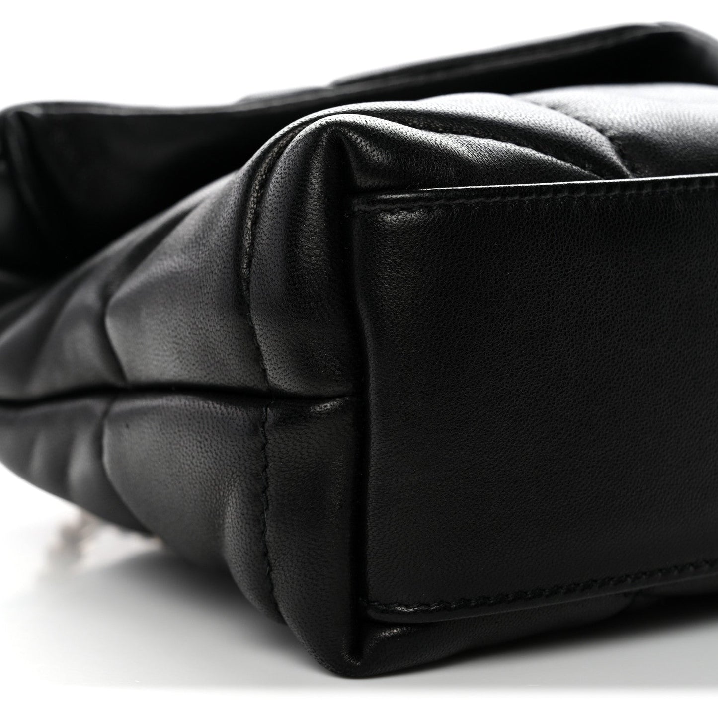 Saint Laurent quilted lambskin satchel corner close-up in black with seam detail