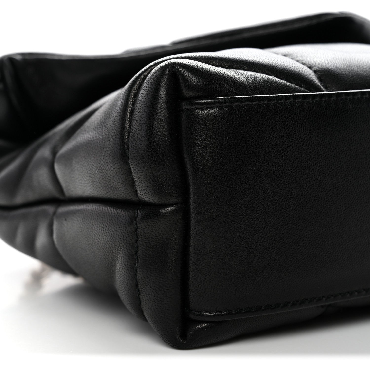 Saint Laurent quilted lambskin satchel corner close-up in black with seam detail