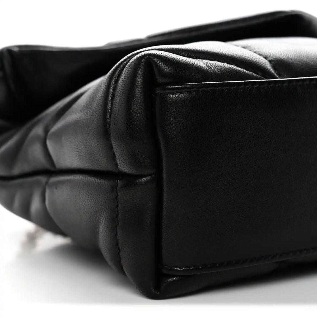 Saint Laurent quilted lambskin satchel corner close-up in black with seam detail
