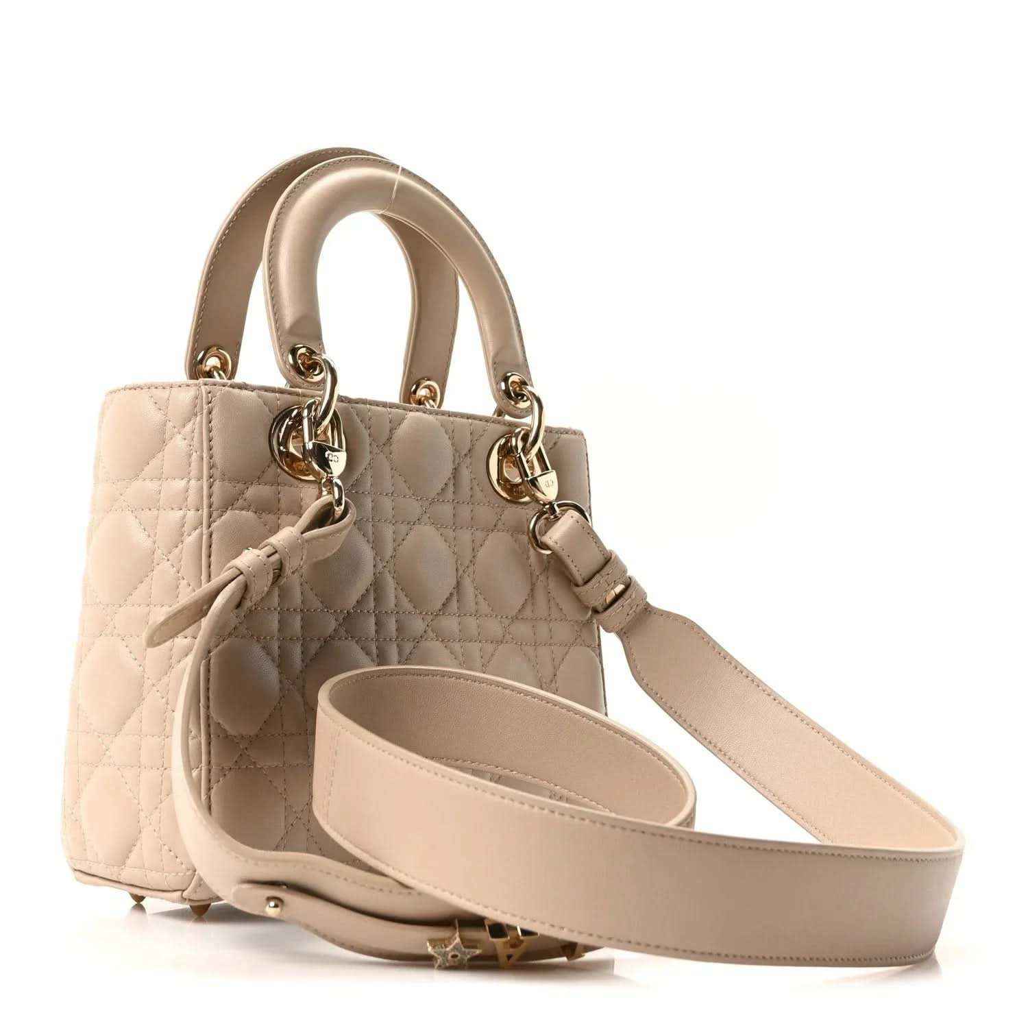 Beige quilted mini handbag with detachable strap and visible interior