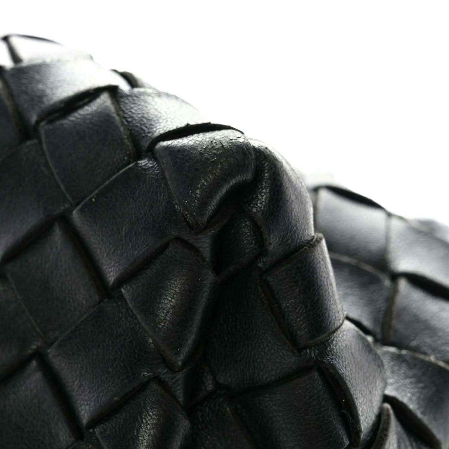 Black intrecciato nappa leather shoulder bag close-up of woven pattern panels