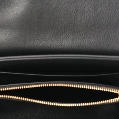 Black leather interior lining with gold-tone zipper track