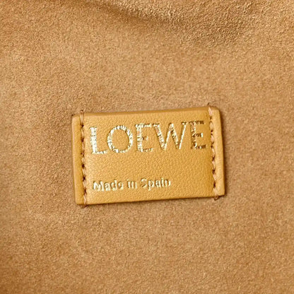 Loewe label on Sahara nappa leather clutch, Made in Spain
