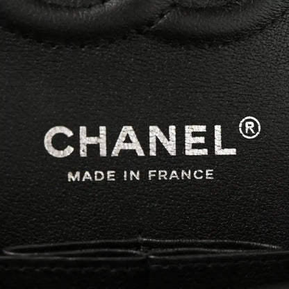 CHANEL logo on black lambskin flap bag lining, Made in France