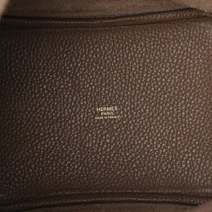 Taupe leather bag interior panel with Hermes Paris made in France stamp.