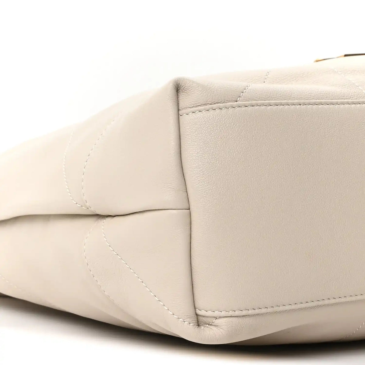 Off-white quilted lambskin shoulder bag with rounded side panel and stitching