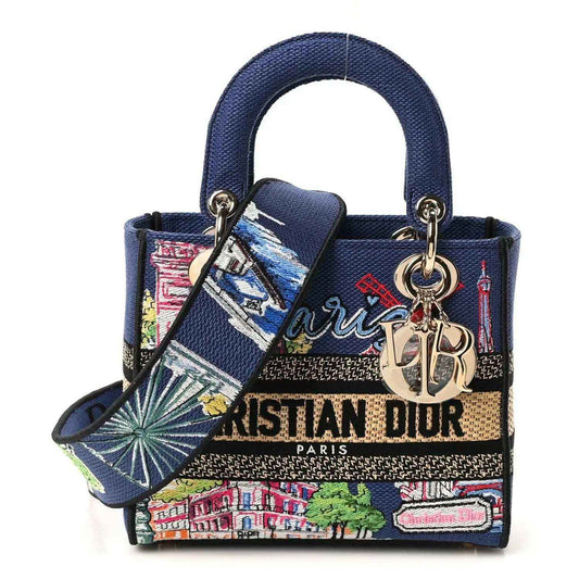 Blue embroidered small handbag with gold top handles and Dior-style charms