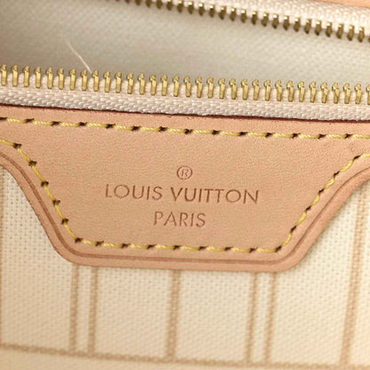 Louis Vuitton Paris interior label on Damier Azur tote bag lining