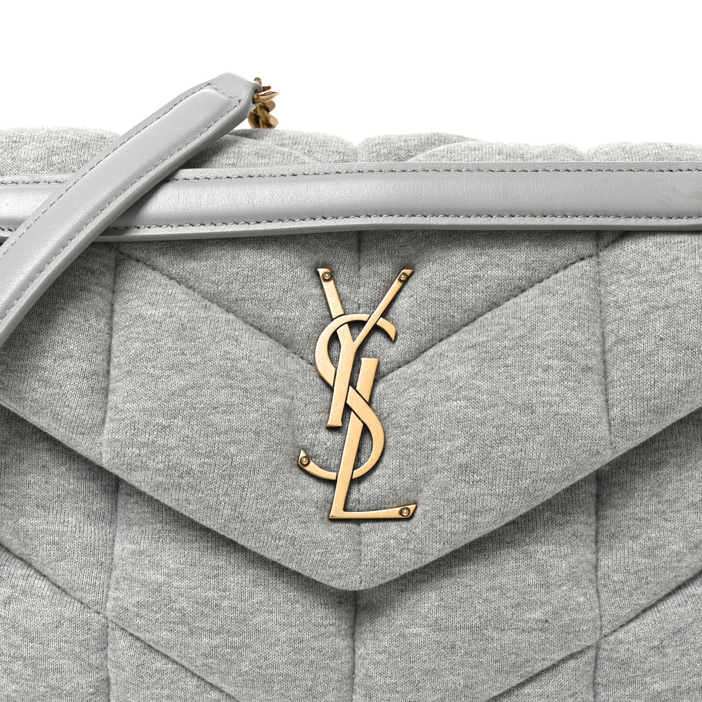 Saint Laurent Loulou puffer satchel flap with gold YSL logo and top handle.