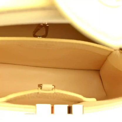 Louis Vuitton Capucines BB handbag interior close-up with gold-toned hardware