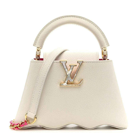 Louis Vuitton Capucines mini handbag, white, top handle and LV clasp