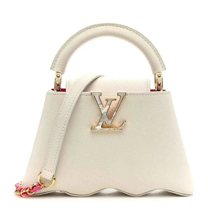 Louis Vuitton Capucines mini handbag, white, top handle and LV clasp
