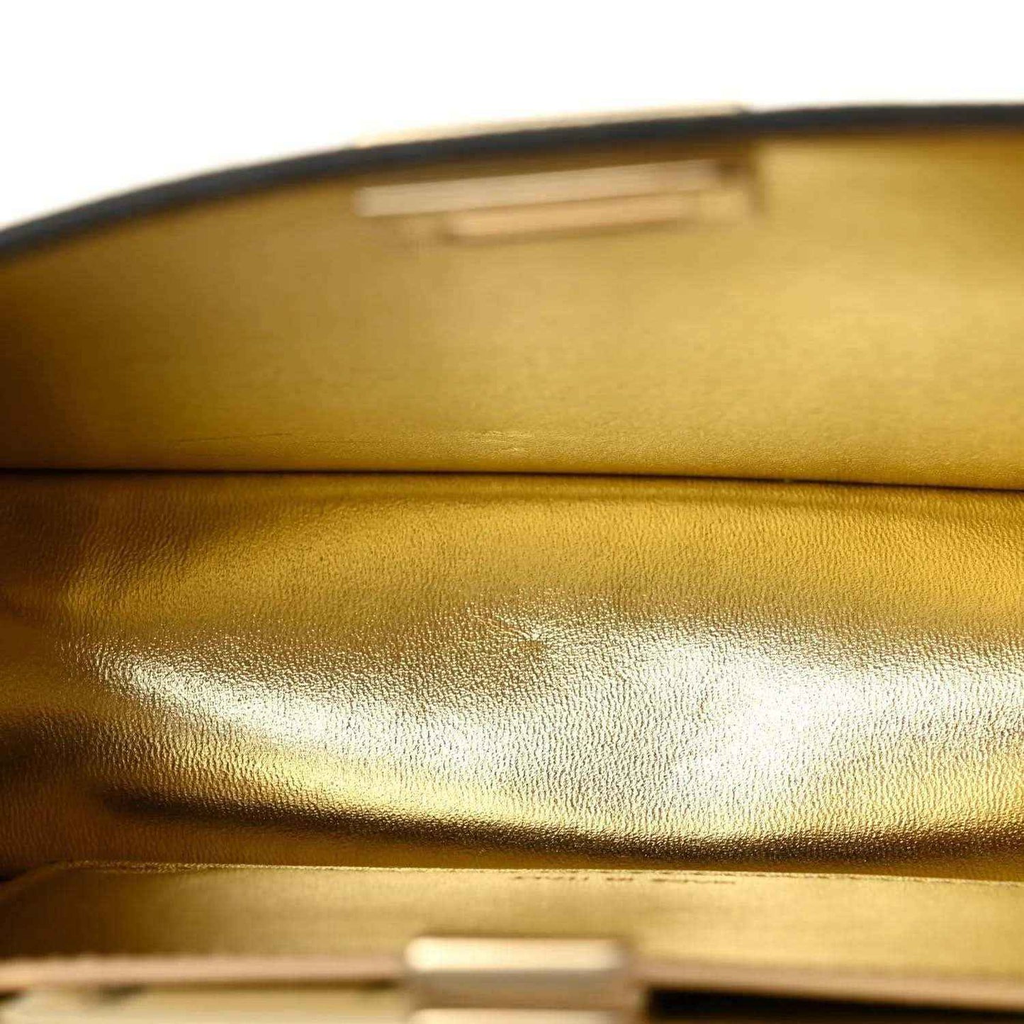 Gold satin-like interior lining with top flap edge and reflective metallic trim