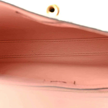 Gucci small hobo bag close-up of pale pink leather lining seam