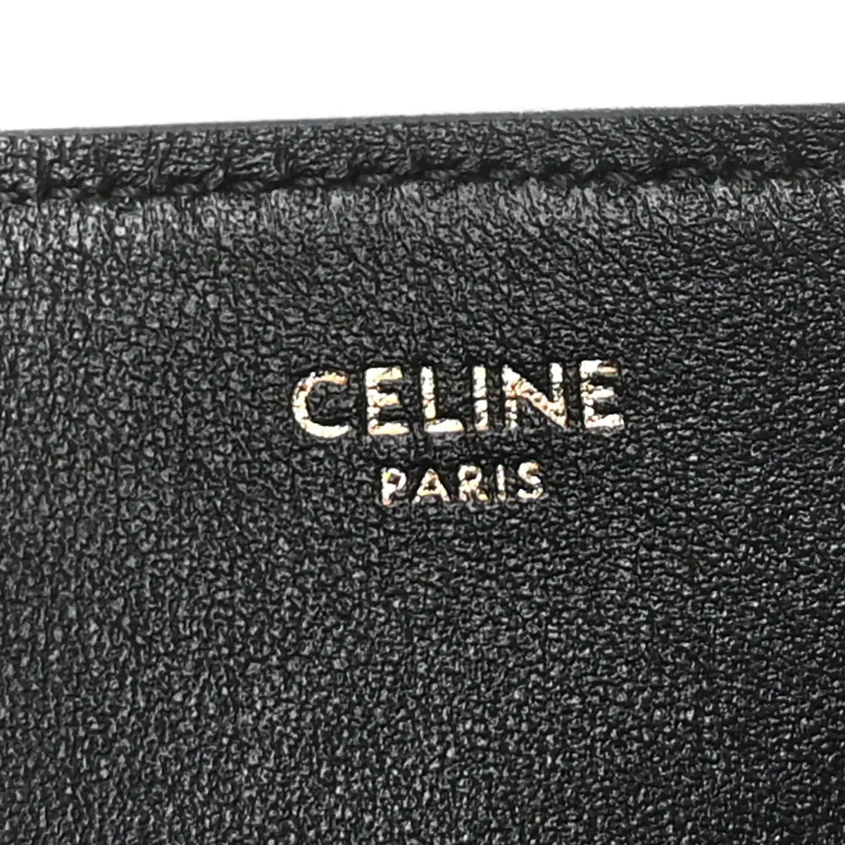 Black leather interior stamp reading “CELINE PARIS”