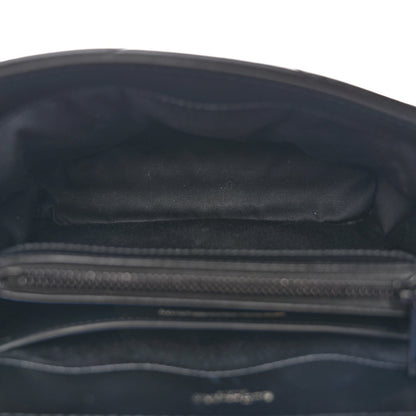 Black satin-lined interior pocket with zipper