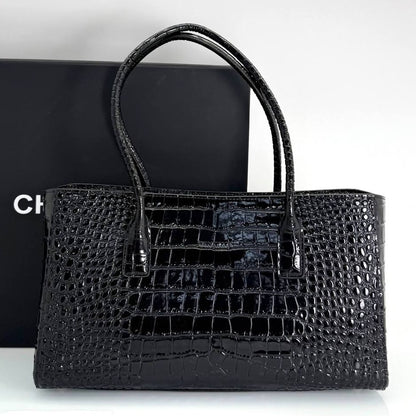 Black croc-embossed small shopping tote with double top handles and front logo plaque