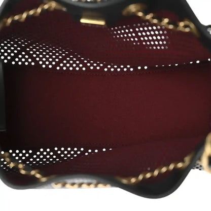 Chanel handbag interior lining in burgundy with perforated dotted panel