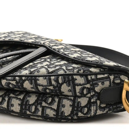 Saddle shoulder bag with Dior Oblique monogram canvas and black leather trim with gold hardware