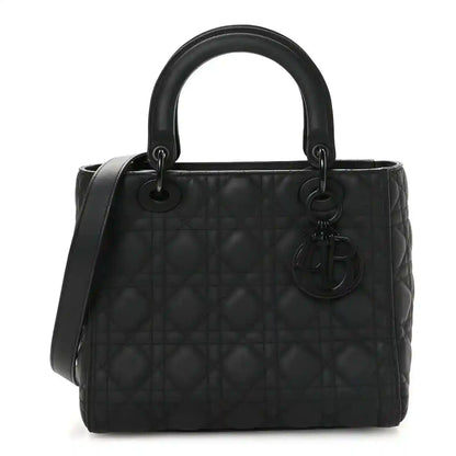 Christian Dior Lady Dior bag in black quilted calfskin, top handles and charm detail