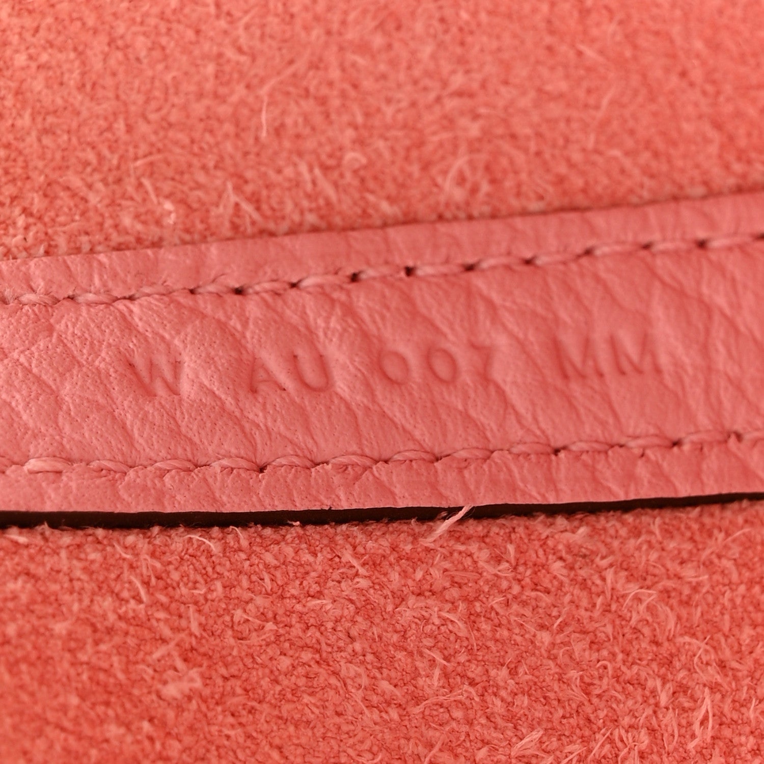 Rose pink leather edge seam with contrast stitching detail