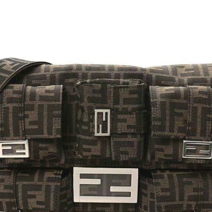 Fendi Zucca canvas flap with central logo plaque and buckle accents, dark brown FF print.