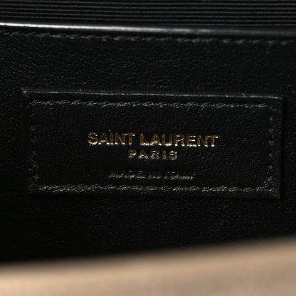 Black leather interior label reading SAINT LAURENT PARIS