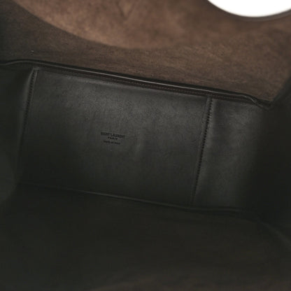 Leather hobo bag interior with stitched panel and small embossed label