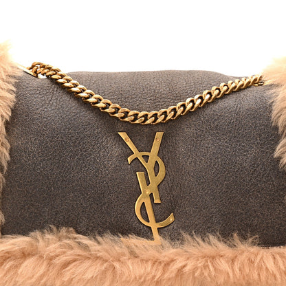 Saint Laurent reversible satchel with dark leather front, YSL monogram charm, gold chain