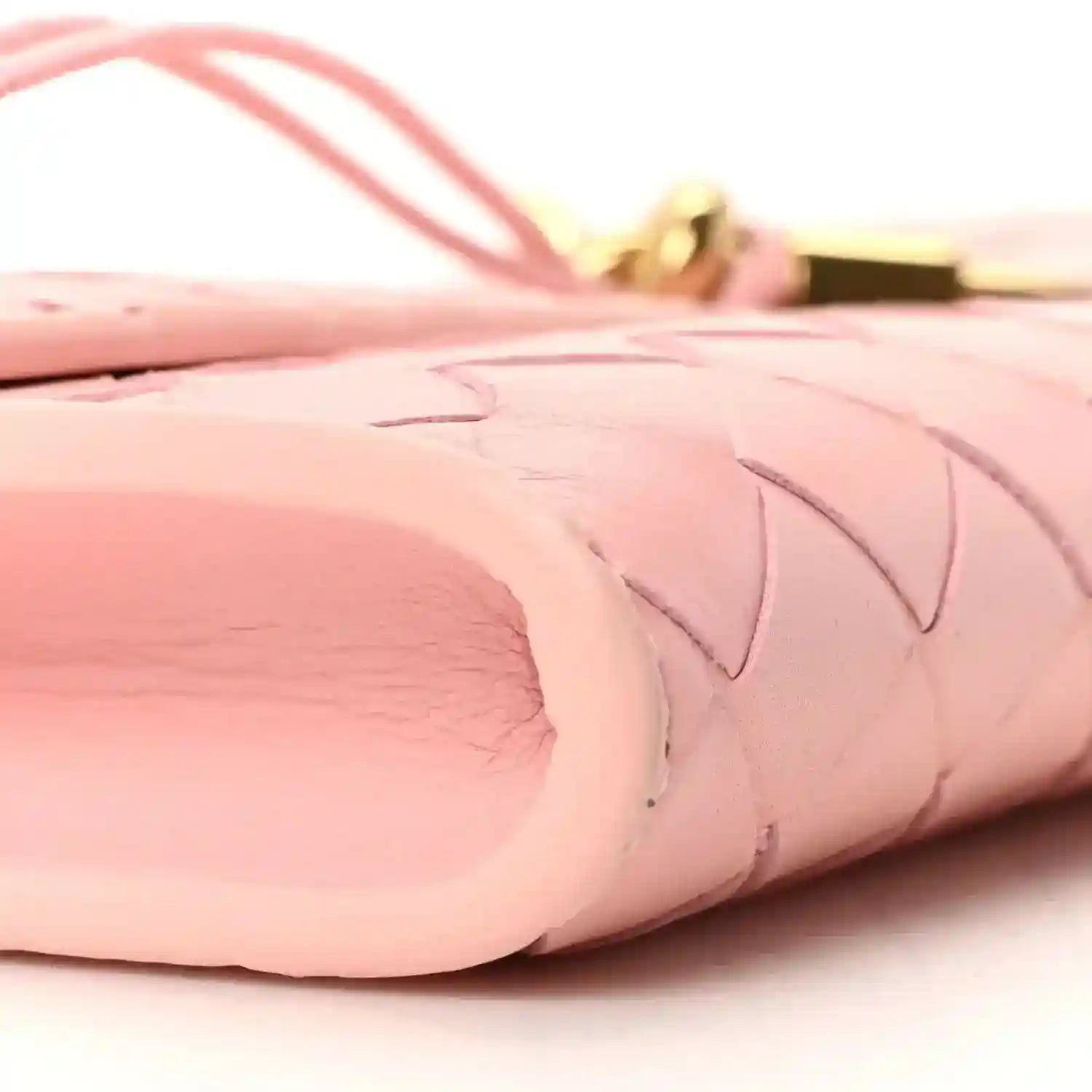 Rose pink woven nappa leather clutch corner with gold-tone hardware