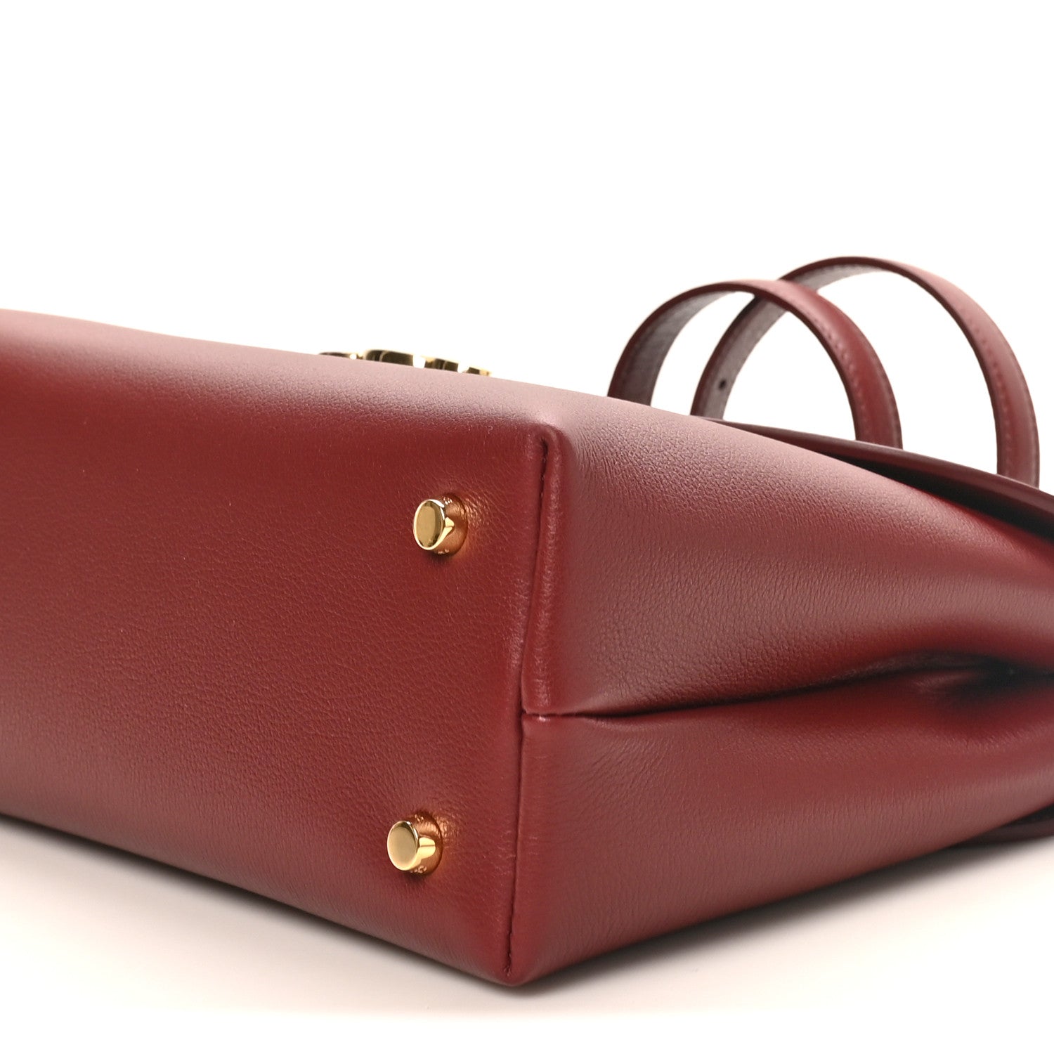 Celine burgundy grained leather bag side with gold studs and top handle