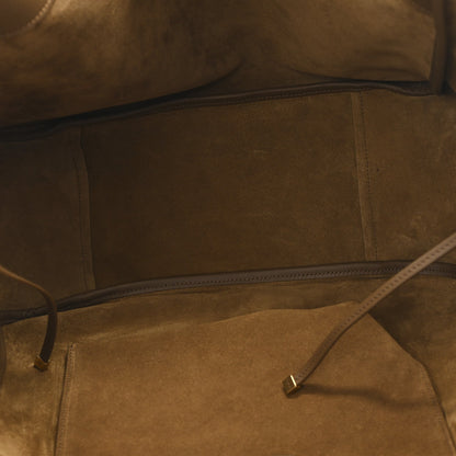 Suede tote bag interior with zip closure and tan suede lining