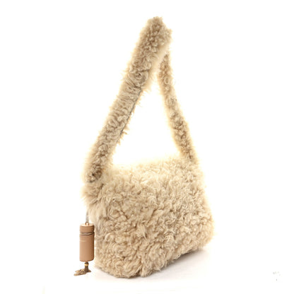 SAINT LAURENT shearling shoulder bag, natural with short top handle and gold clasp