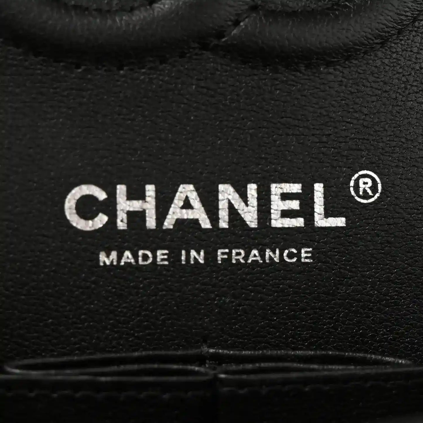 CHANEL lambskin flap bag lining text: CHANEL and Made in France