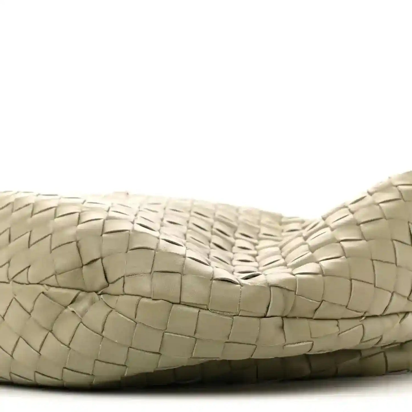 Close-up of woven leather bag exterior with top edge seam, travertine light taupe