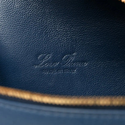 Loro Piana embossed logo on navy grained calfskin with gold zipper trim