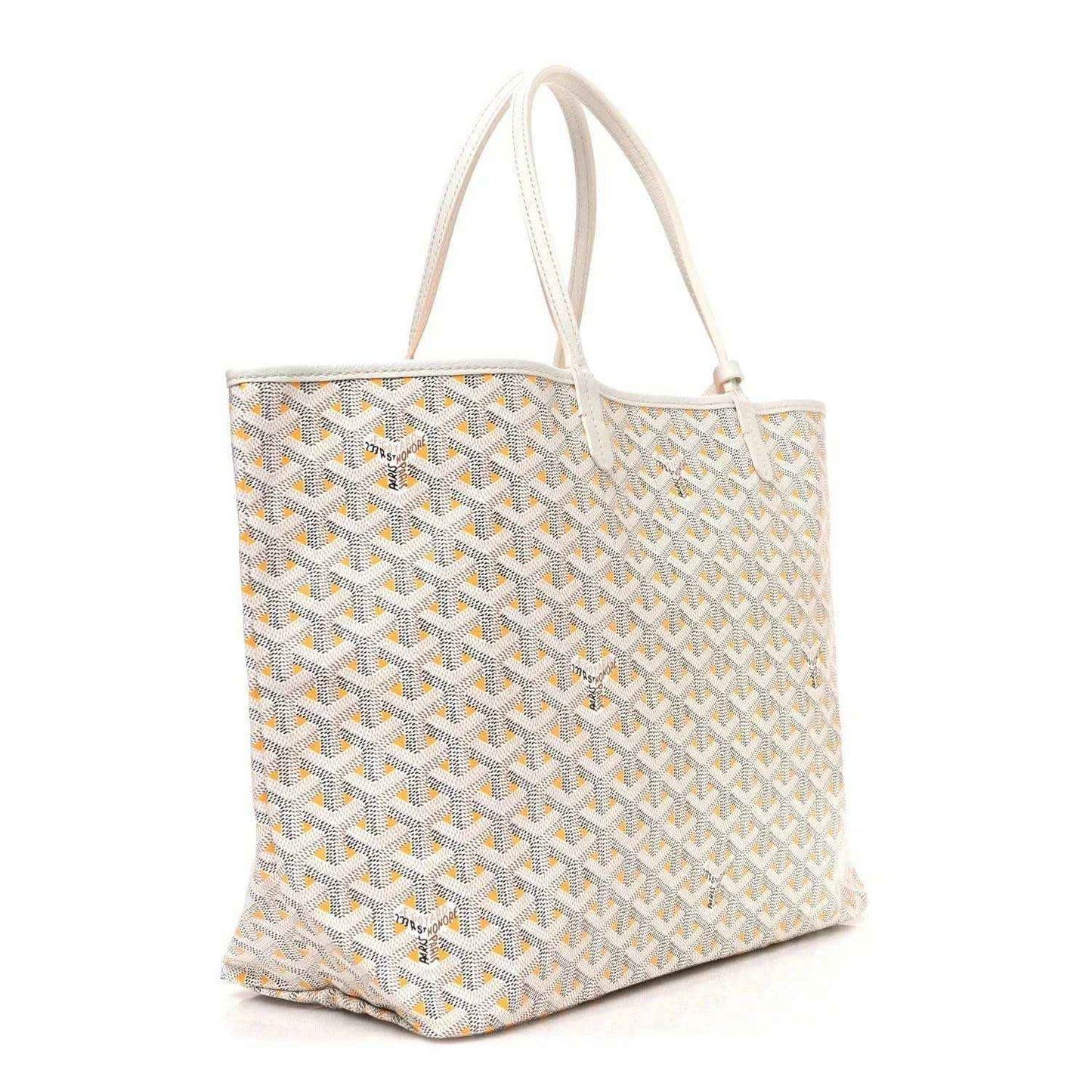 White and yellow patterned tote bag with dual handles, side angle