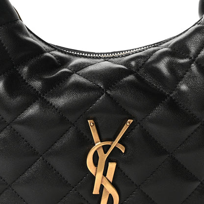 Quilted black leather bag with gold YSL monogram clasp