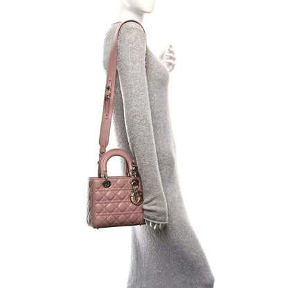 Small Lady Dior bag with adjustable shoulder strap in blush pink quilted cannage