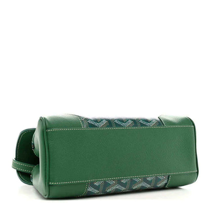 Green mini Saigon bag viewed from the side, showing flap, stitched trim, and strap