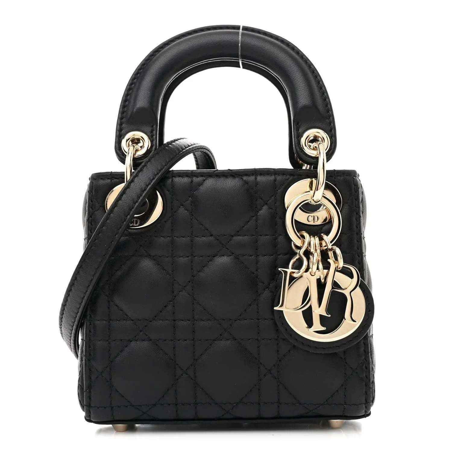 Black quilted micro handbag with gold-tone handles and Lady Dior charm
